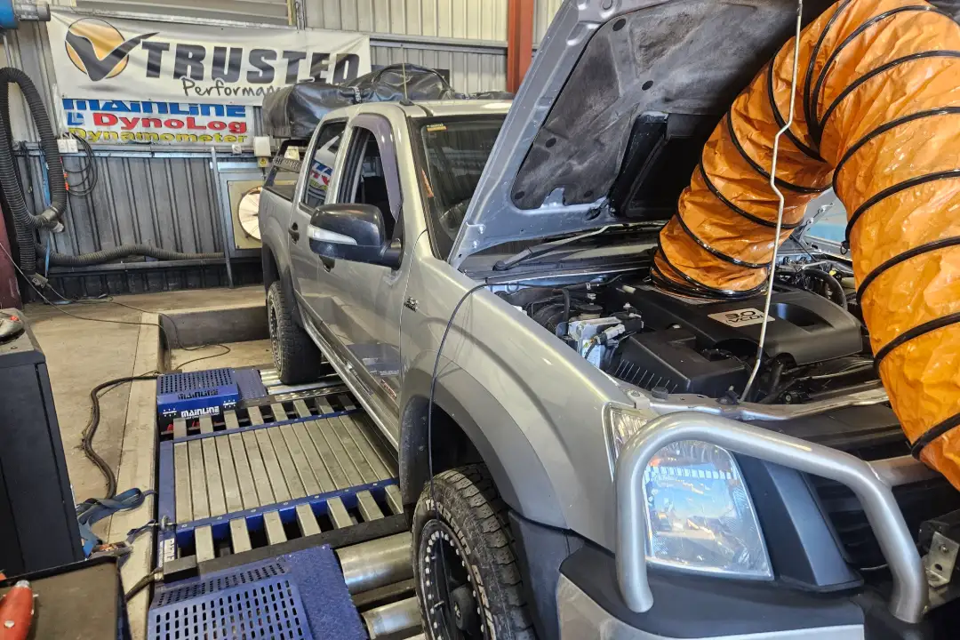 Diesel mechanic working on a common-rail engine in Adelaide