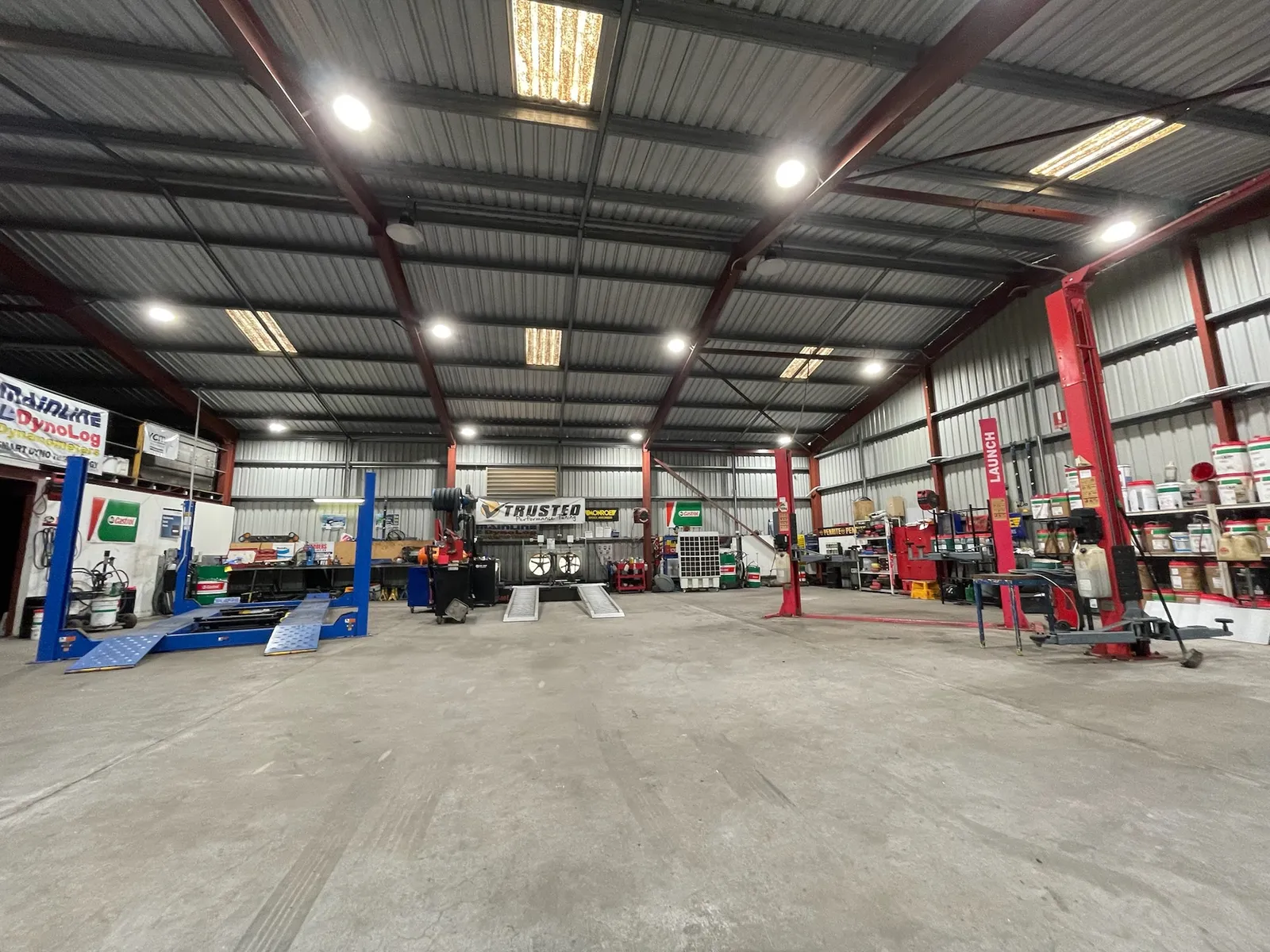 Inside the Trusted Mechanical workshop in Lonsdale, Adelaide, with hoists and the in-house dyno